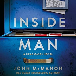 The audiobook cover of Inside Man by John McMahon showing a blue filing cabinet with a crooked paper label in a metal holder reading FBI. The drawer below the label is partially open showing a glimpse of the file folders it contains, two of which have labels sticking up, but both titles have been obscured out with strokes of a red marker.